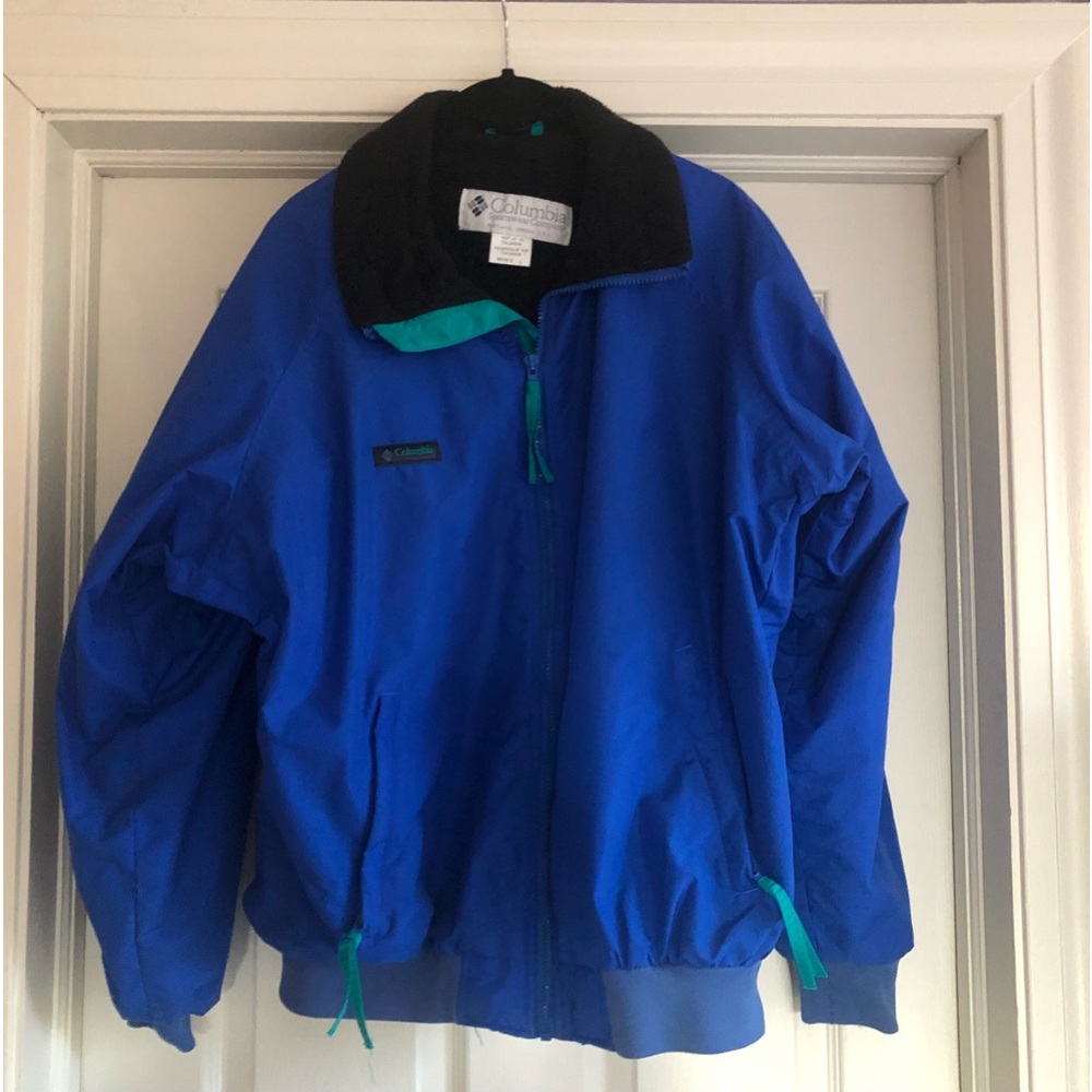 Handsome, royal blue large men’s Columbia jacket with black fleece lining.